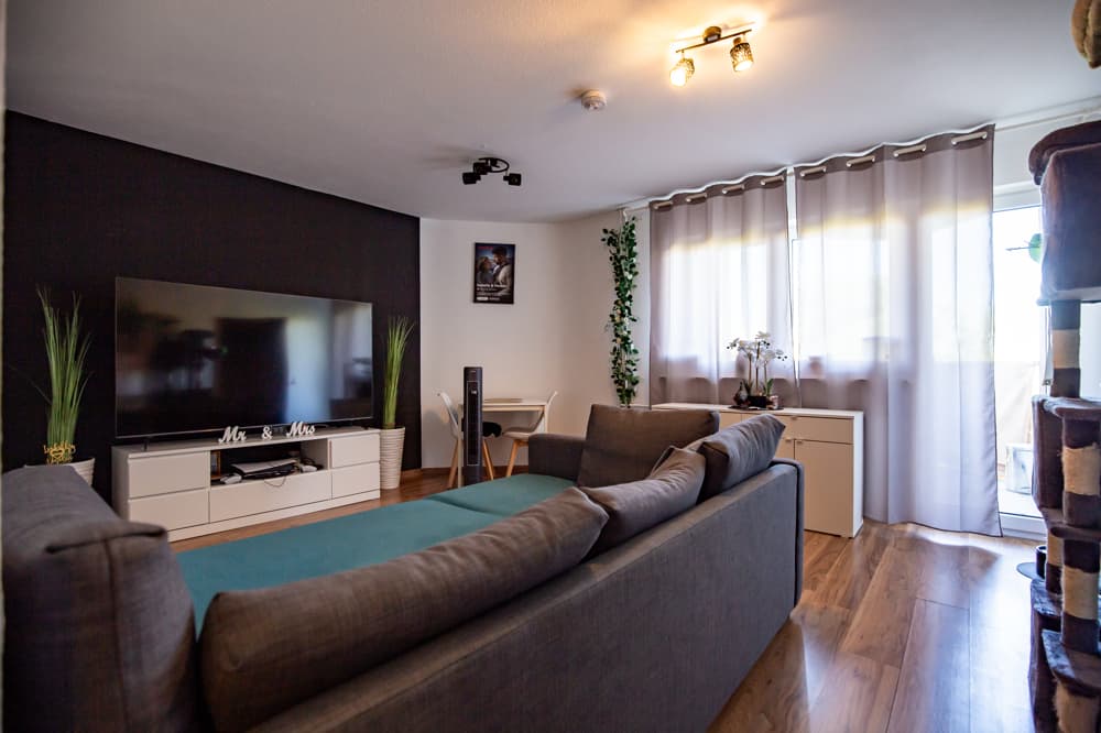 Wohnzimmer — 2-Zimmer-Wohnung mit Loggia im 3. Obergeschoss in Mainz-Hartenberg-Münchfeld